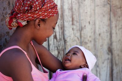 African mother with baby girl, location Mmankgodi village , Botswana